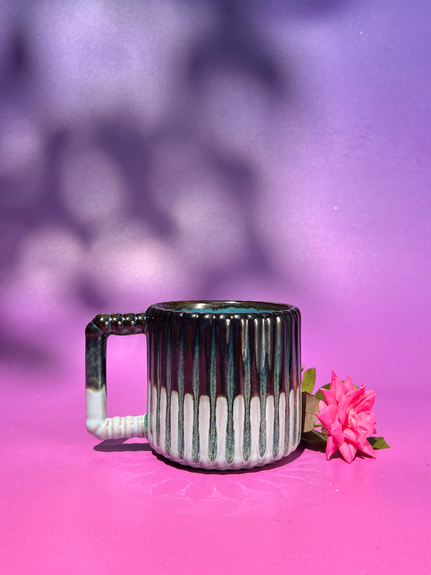Gozarian Mug with Vertical Texture in Iron and Aqua over Brick