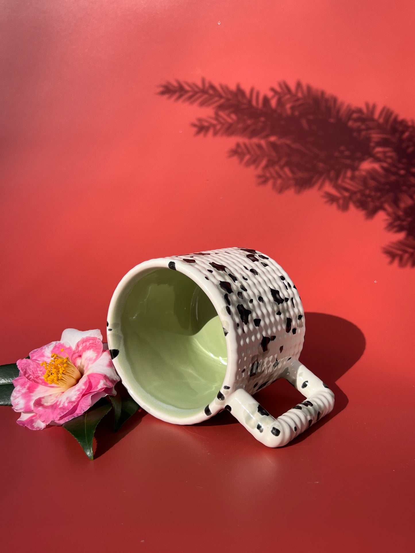Gozarian Mug with Little Dimple Texture in White and Black Splotch