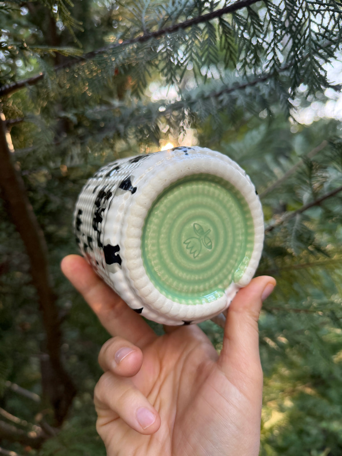1 DONATION 14oz Gozarian Mug with Little Dimple Texture in White and Black Splotch and Mint Green
